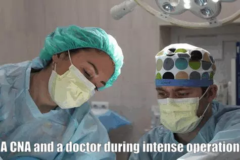 an image of a CNA and doctor during operation.